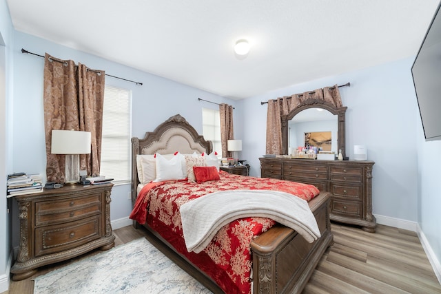 bedroom featuring light hardwood / wood-style floors