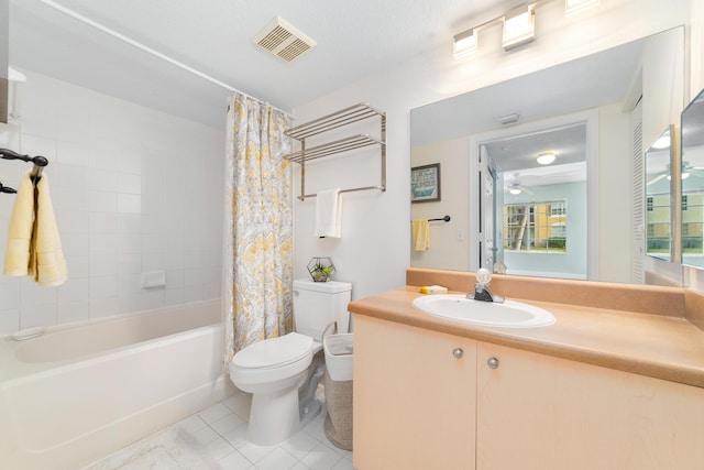 full bathroom with shower / tub combo with curtain, vanity, ceiling fan, toilet, and tile patterned floors