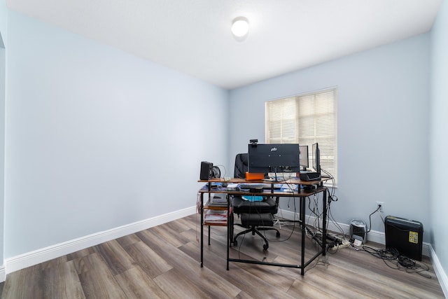 home office with light wood-type flooring