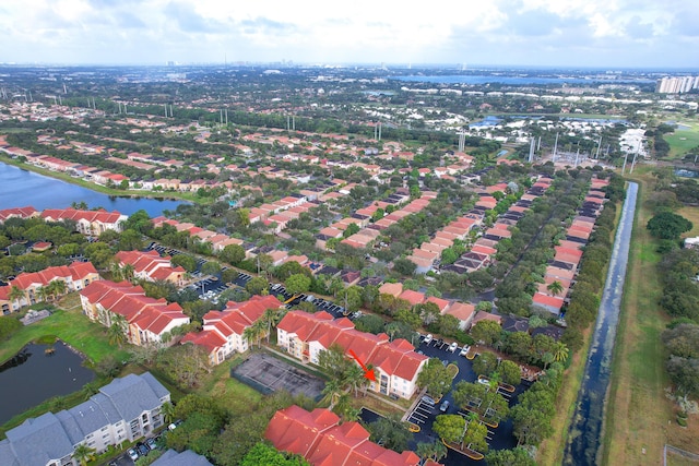 bird's eye view with a water view