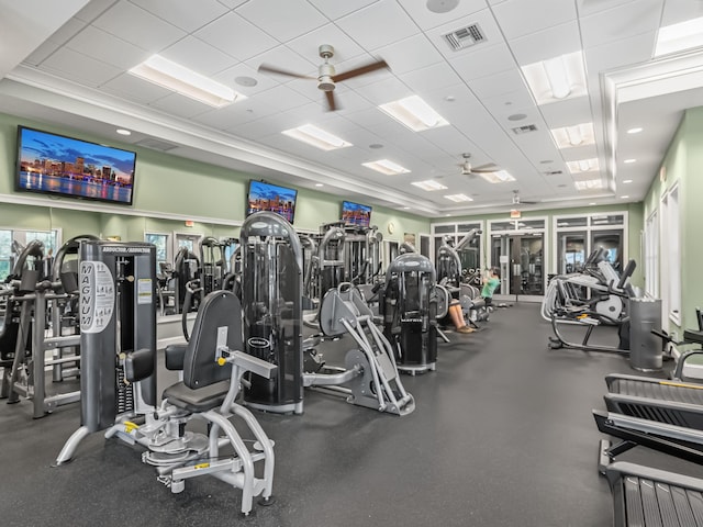 workout area with a paneled ceiling