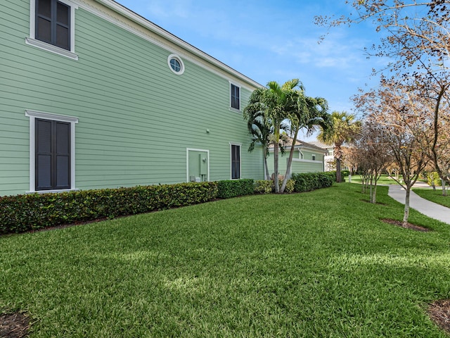 view of property exterior featuring a yard