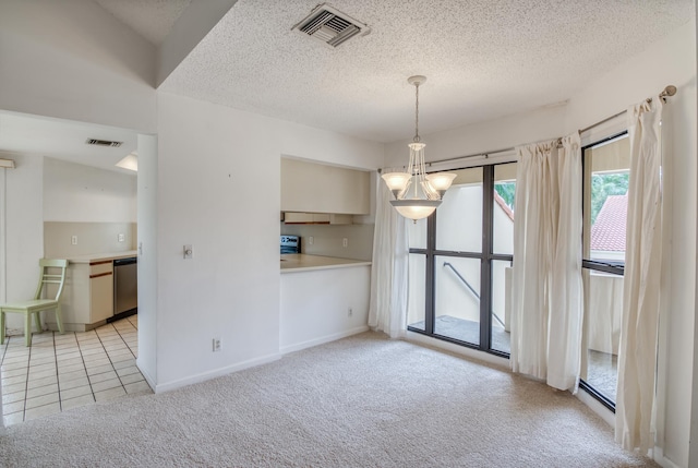 unfurnished dining area featuring a textured ceiling, a notable chandelier, and light carpet