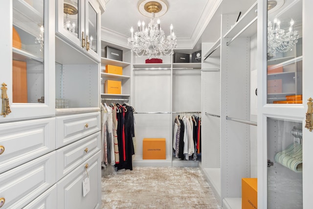 spacious closet featuring a notable chandelier