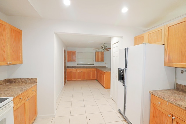 kitchen with ceiling fan, light tile patterned flooring, and white appliances