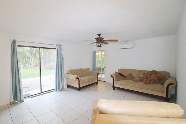 living room featuring ceiling fan, light tile patterned floors, a wealth of natural light, and a wall mounted AC