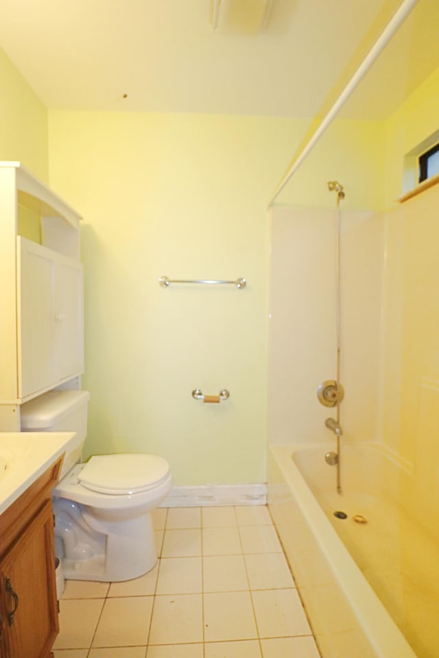 full bathroom featuring tile patterned floors, vanity, tub / shower combination, and toilet