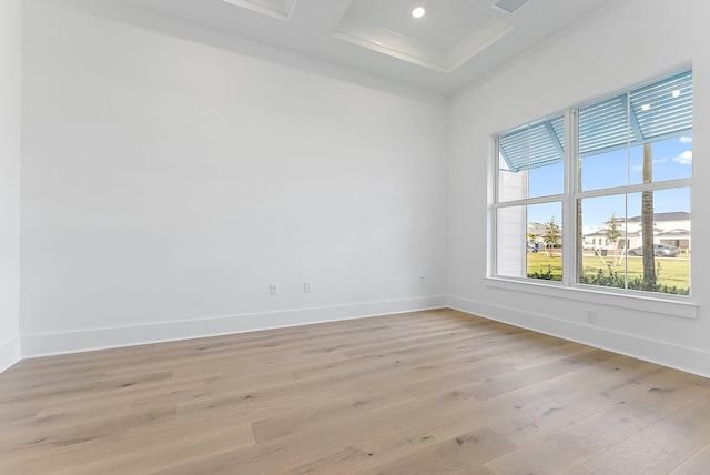 spare room with light hardwood / wood-style floors