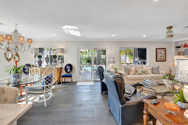 living room with a notable chandelier