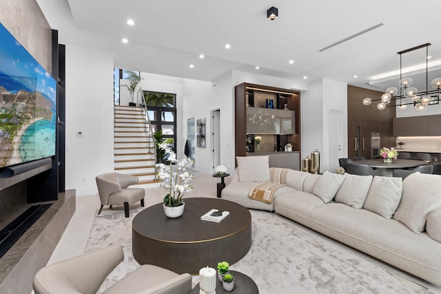 living room with an inviting chandelier