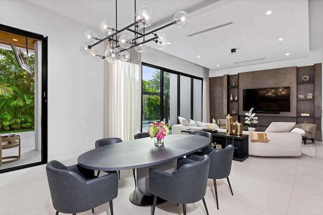 dining space featuring a healthy amount of sunlight and light tile patterned floors