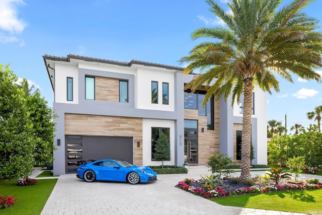 view of front of property with a garage