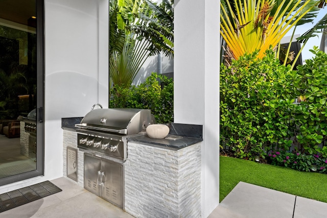 510 NE 4th Ln, Boca Raton, FL 33432 - view of patio featuring a grill and exterior kitchen