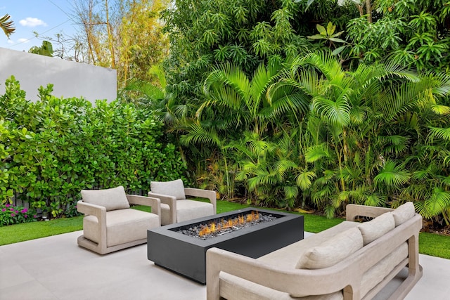 view of patio featuring a fire pit