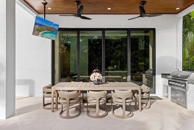 view of patio / terrace with grilling area, ceiling fan, and area for grilling