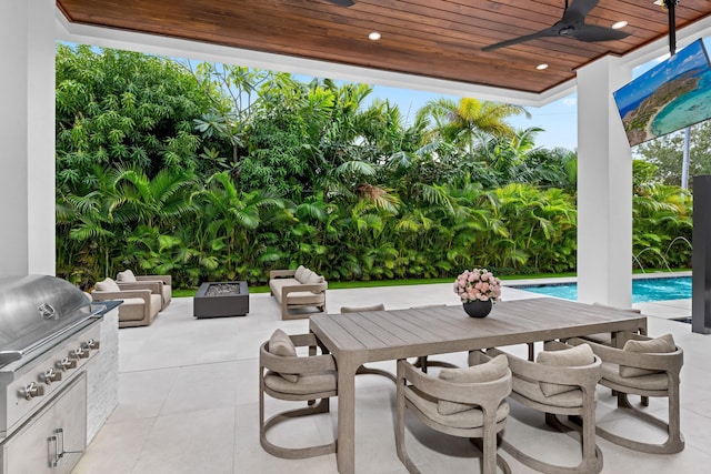 view of patio with ceiling fan, grilling area, area for grilling, and outdoor lounge area