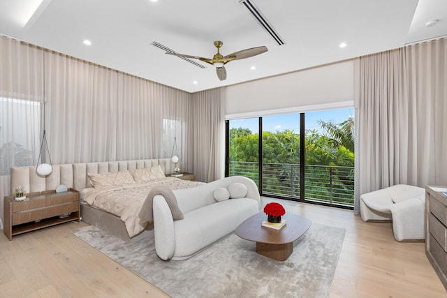 bedroom featuring access to outside, ceiling fan, and light hardwood / wood-style floors