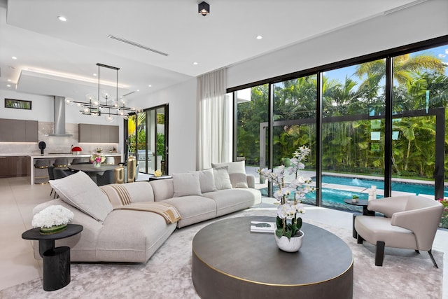 living room featuring an inviting chandelier