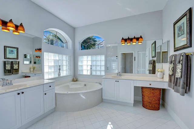 bathroom featuring vanity, tile patterned flooring, and plus walk in shower