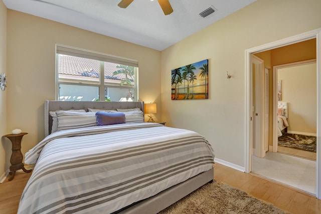 bedroom featuring ceiling fan and light wood-type flooring