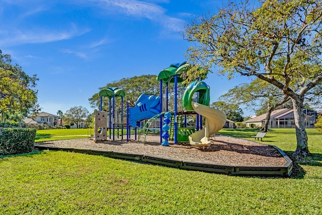 view of play area featuring a lawn