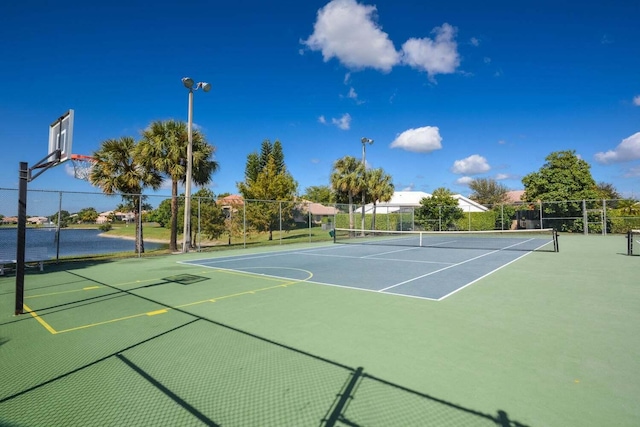 view of sport court with basketball hoop