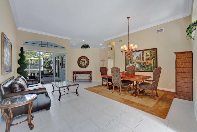 dining area featuring ornamental molding, a chandelier, and light tile patterned flooring