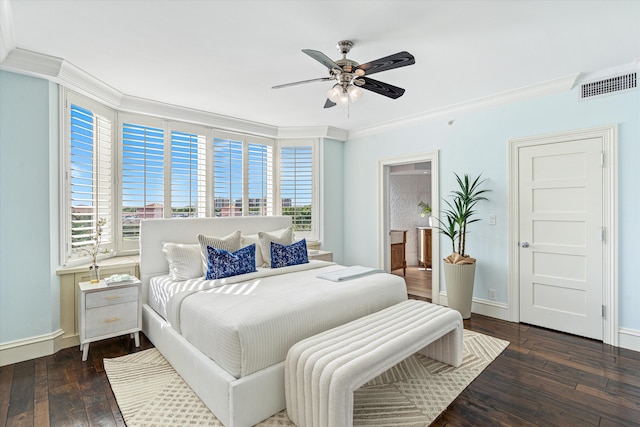 bedroom with ceiling fan, dark hardwood / wood-style flooring, and crown molding