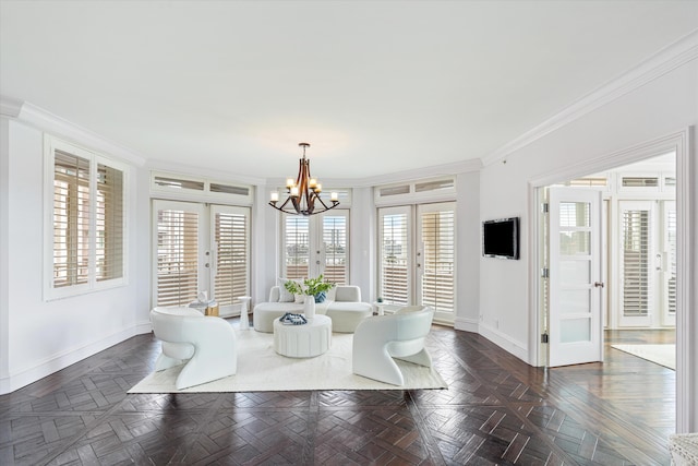 dining room with crown molding, a wealth of natural light, and french doors