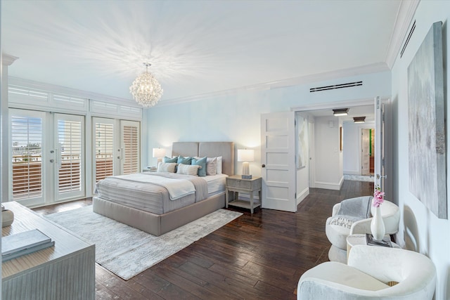 bedroom with dark wood-type flooring, french doors, access to exterior, ornamental molding, and a chandelier