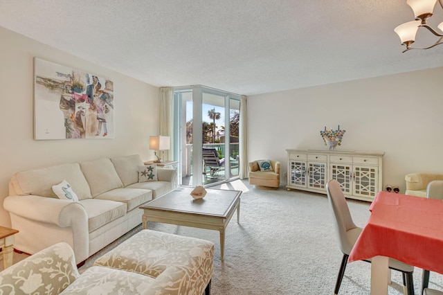 carpeted living room featuring floor to ceiling windows and a textured ceiling