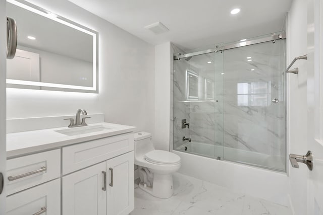 bathroom with enclosed tub / shower combo, toilet, recessed lighting, vanity, and marble finish floor