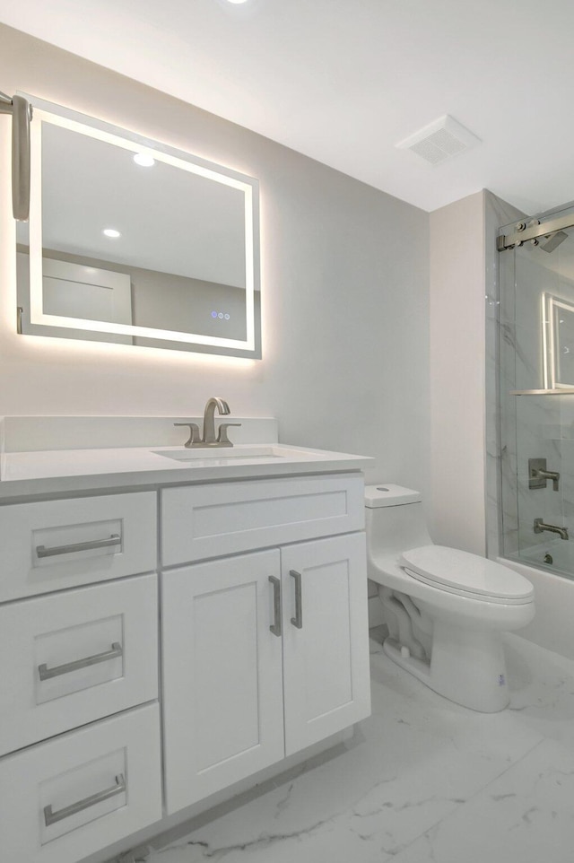 full bath with shower / bathtub combination, toilet, visible vents, vanity, and marble finish floor