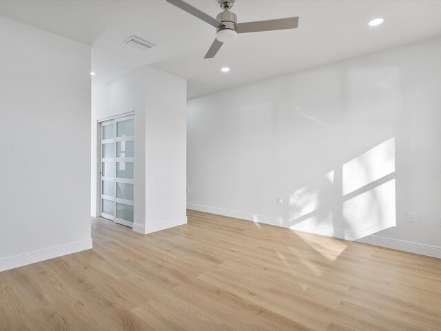 hallway with light wood-type flooring