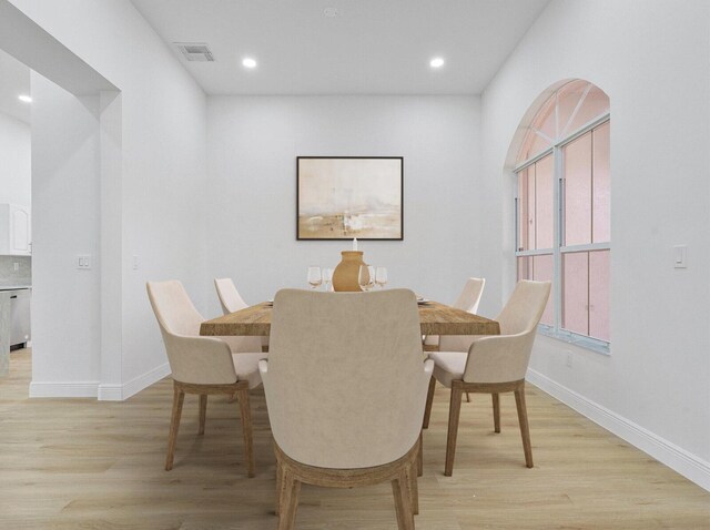 spare room featuring light hardwood / wood-style flooring