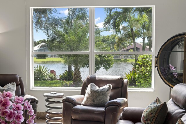 living area with a water view