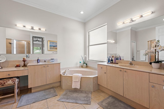 bathroom featuring tile patterned flooring, vanity, and a healthy amount of sunlight