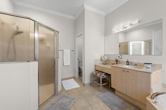 full bathroom featuring toilet, vanity, separate shower and tub, and tile patterned floors