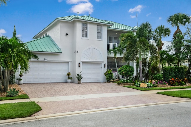 view of front of property featuring a garage