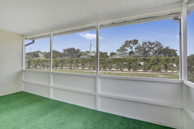 unfurnished sunroom featuring a healthy amount of sunlight