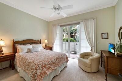 carpeted bedroom with access to exterior, ceiling fan, and ornamental molding