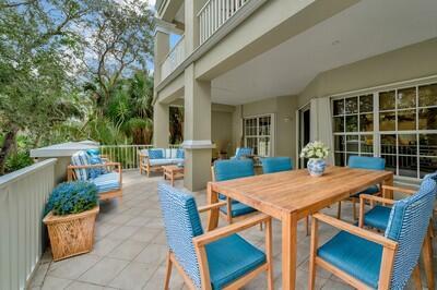 view of patio with outdoor lounge area and a balcony