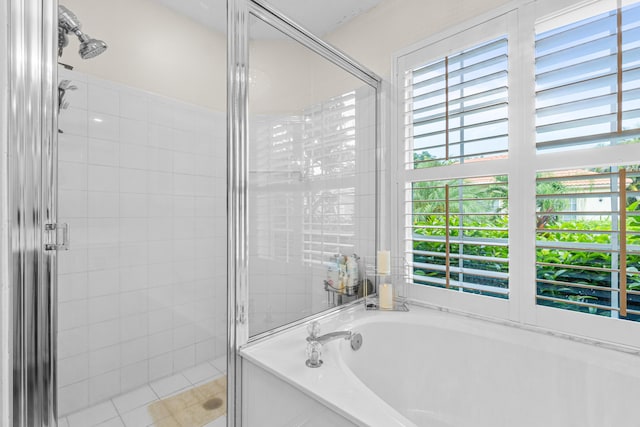 bathroom with separate shower and tub