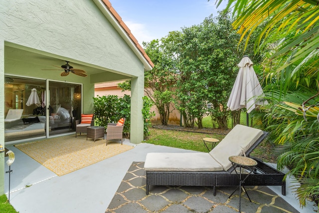 view of patio with ceiling fan