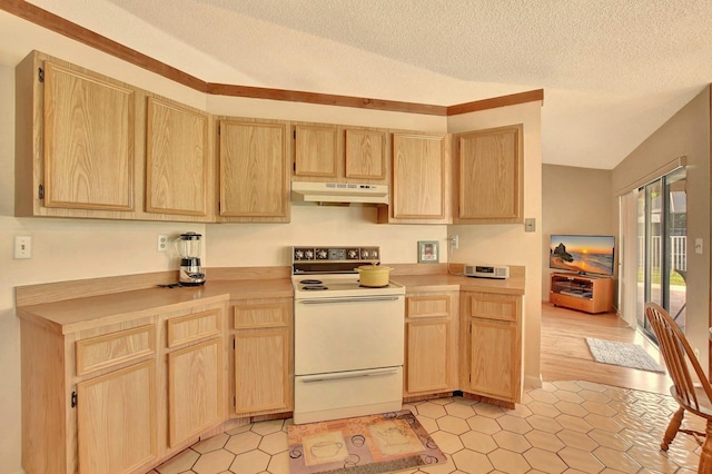 kitchen featuring range with electric cooktop, light brown cabinetry, and a textured ceiling