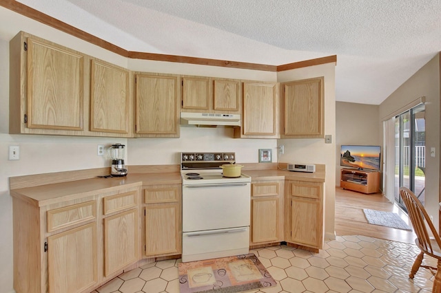 kitchen with white range with electric cooktop, light brown cabinetry, and a textured ceiling