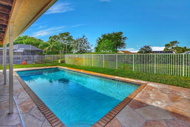 view of swimming pool with a patio area