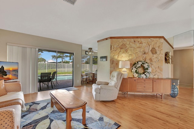 living room with light hardwood / wood-style floors