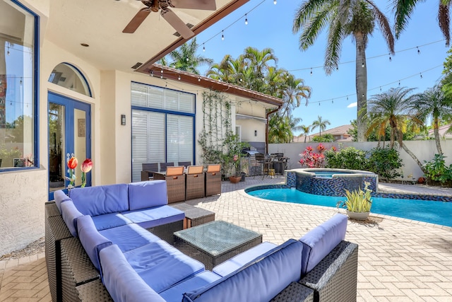 view of swimming pool featuring outdoor dining space, a fenced backyard, ceiling fan, a patio area, and an outdoor hangout area