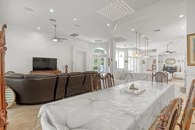 dining space with recessed lighting, visible vents, light wood finished floors, and ceiling fan